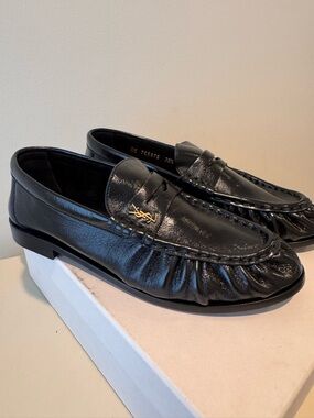 Saint Laurent Black Leather Penny Loafers with Gold Monogram